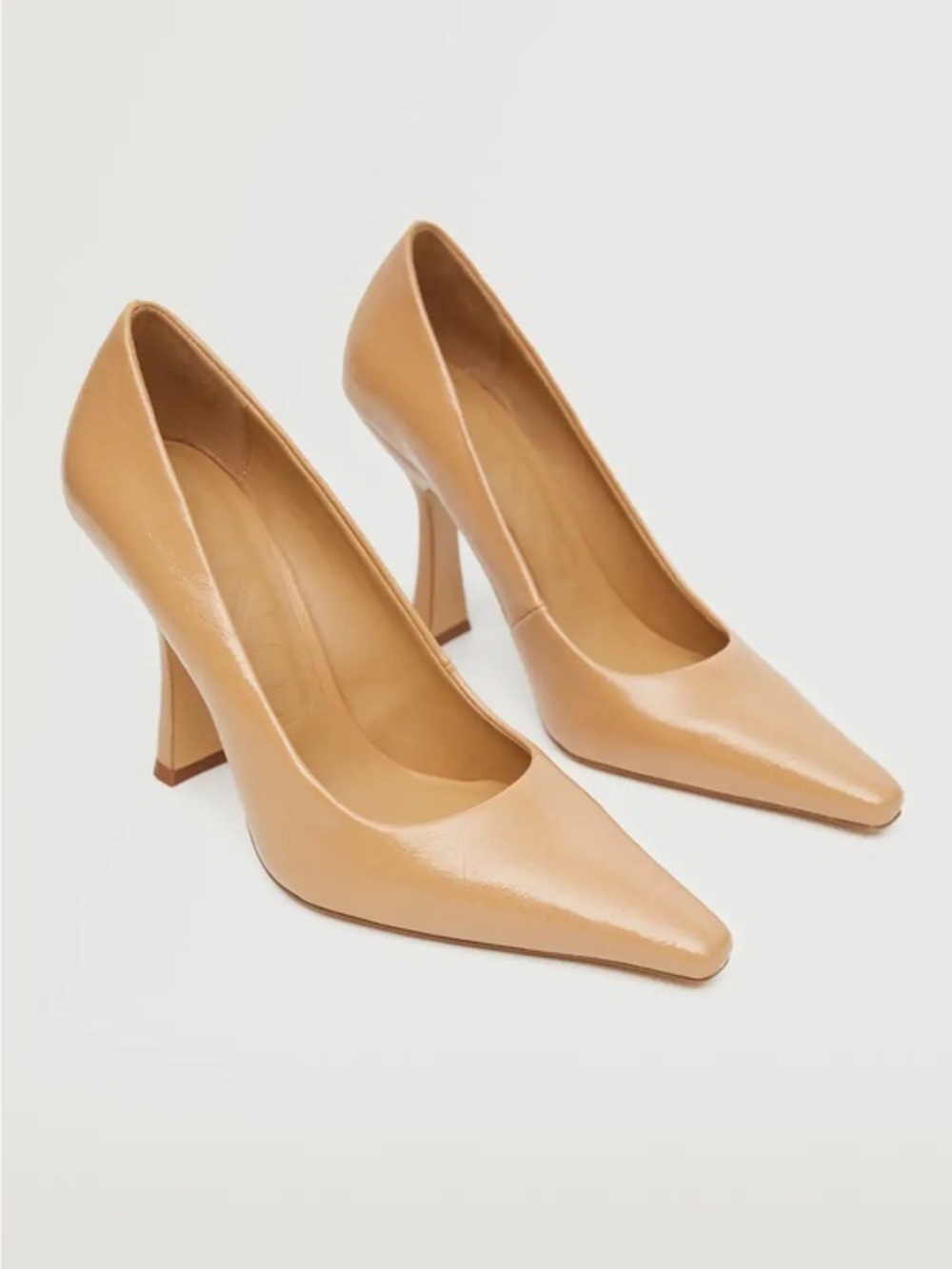 Tan Pointed toe pumps / heels